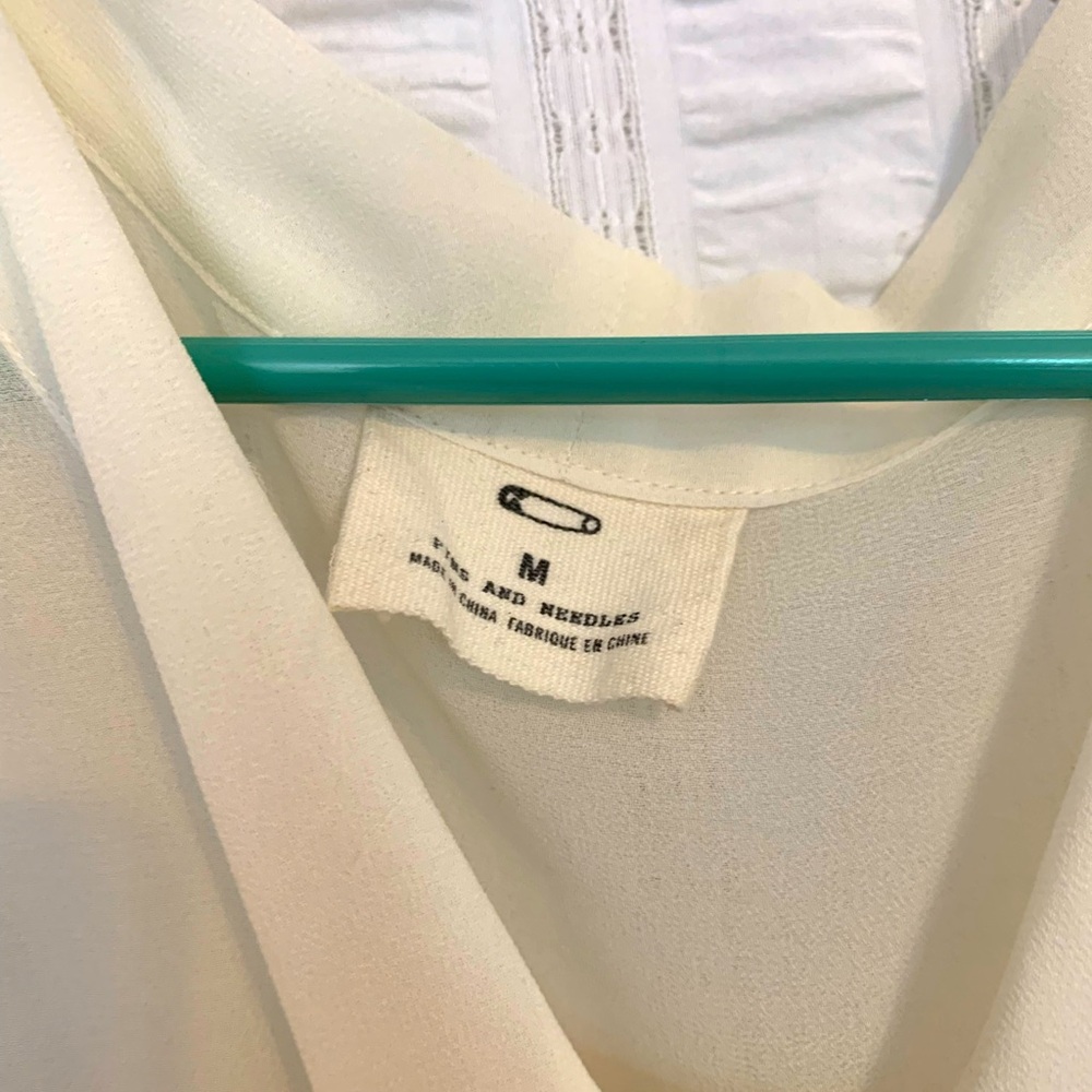 medium elegant sheer blouse with bow at the neck, like new